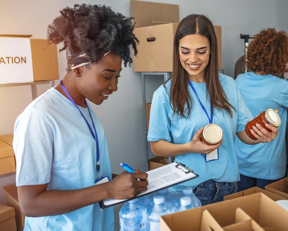 Nonprofit volunteers sort food donations